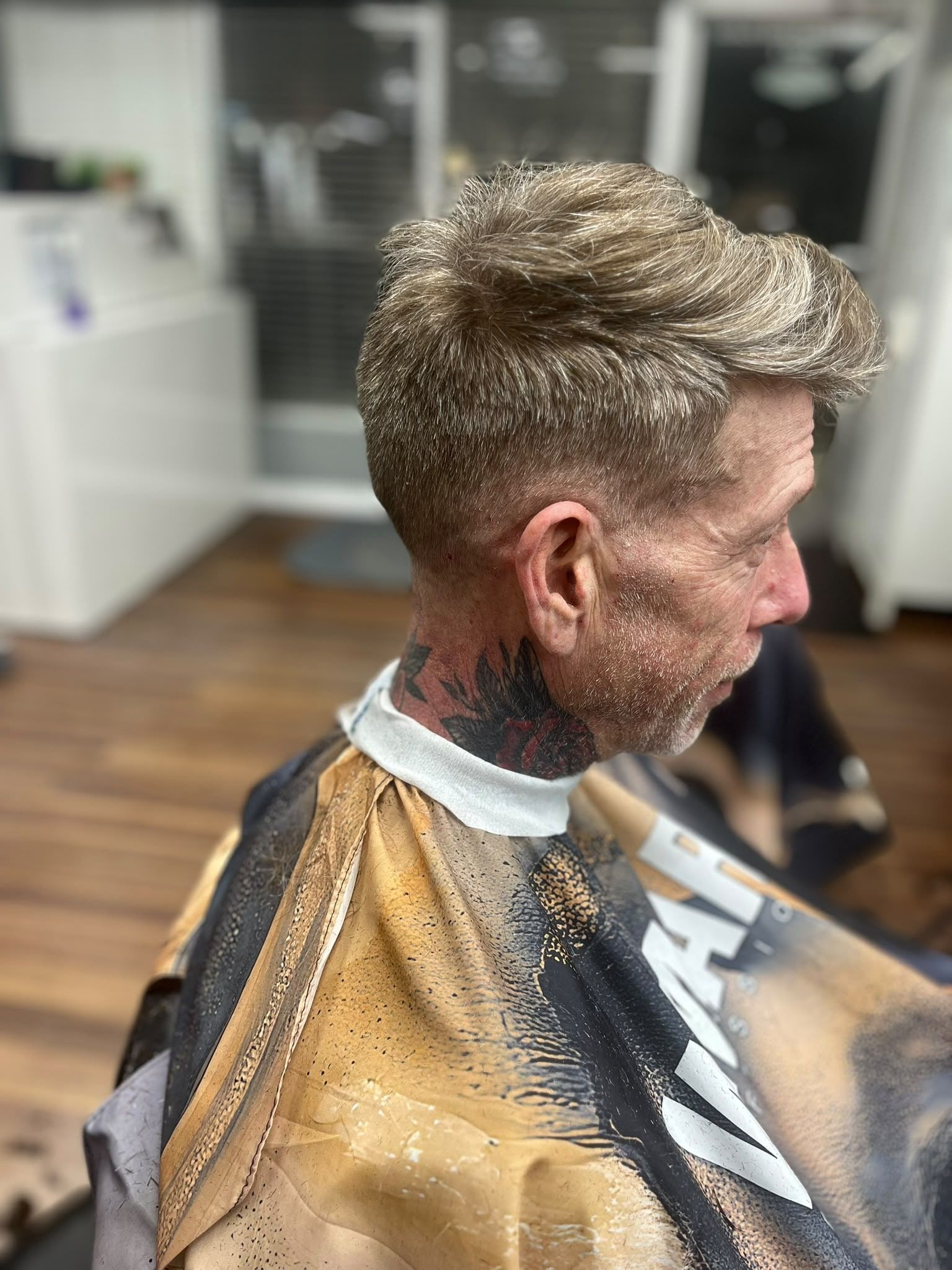 Textured grey quiff with tapered sides