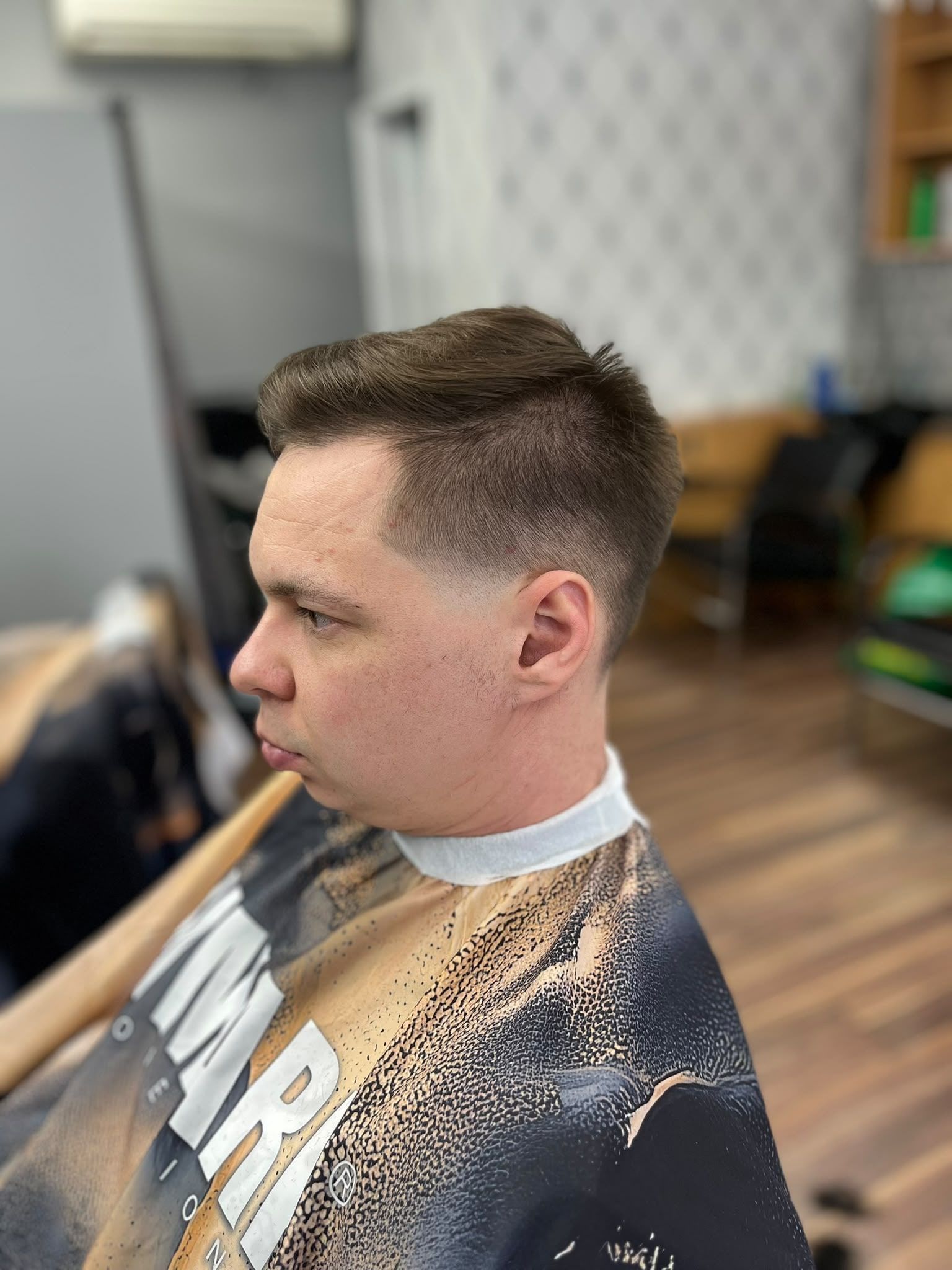 Short textured top with a low fade