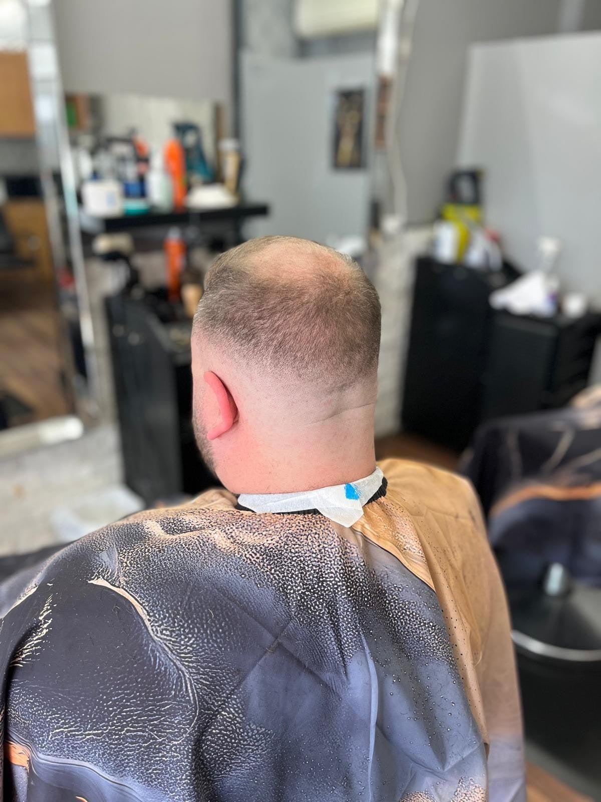 Short taper with a blended neckline, back view